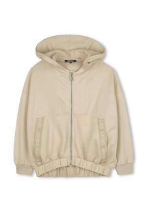 Sweat à capuche zippé beige avec une capuche, une taille élastique et des accents de logo imprimés sur le côté. Tissu doux avec une texture lisse.
