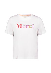 White cotton T-shirt featuring the word "Merci" in multi-colored block letters with small embellishments on the letters. Short sleeves.
