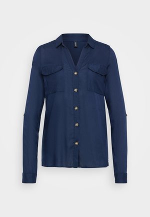 Navy blue button-up shirt with long sleeves, two chest pockets, and gold-tone buttons. Smooth fabric with a collar and slightly relaxed fit.