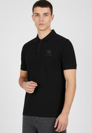 BEKLEIDUNG XT - Piké - black