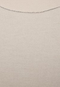 Beige ribbed fabric with a fine silver metallic thread detail along a curved edge.