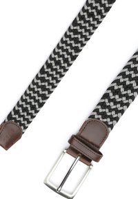 Woven belt in black and white with a herringbone pattern, featuring brown leather accents and a silver metal buckle.