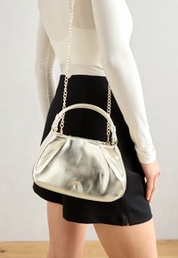 Handtasche - gold
