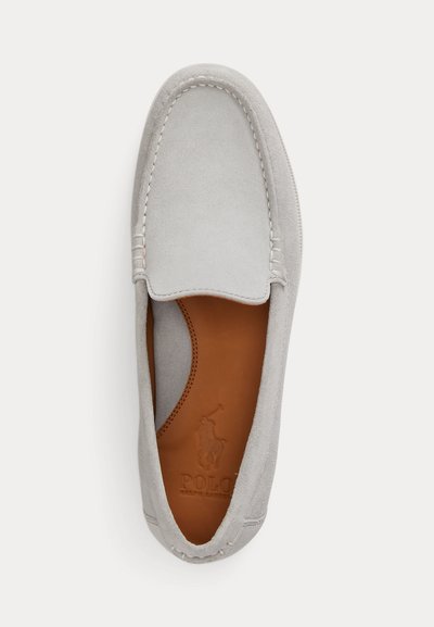 Light gray suede loafer with moccasin stitching and brown leather insole embossed with Polo Ralph Lauren logo.