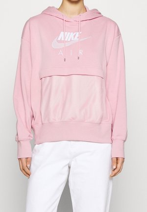 Felpa Nike rosa chiaro con pannello in rete, vestibilità oversized, cappuccio, lacci e stampa bianca "NIKE AIR" sul davanti.