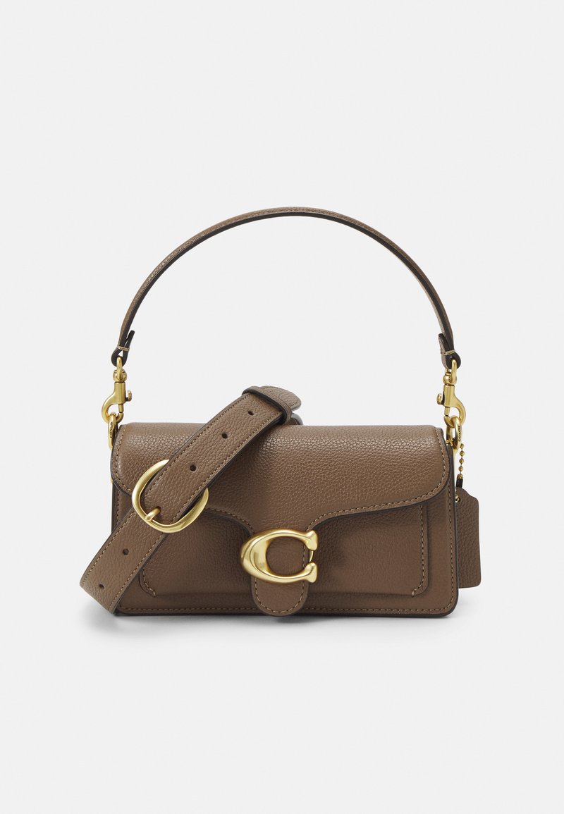 Brown leather handbag with a textured finish, gold-tone hardware, adjustable strap, flap closure, and accent detailing on the front.