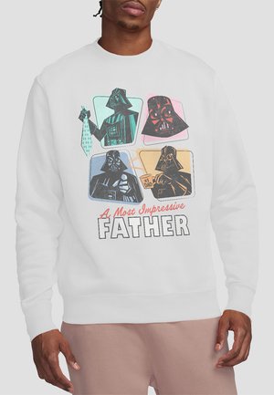 White sweatshirt featuring four graphic illustrations of a character in different poses, with "A Most Impressive FATHER" text below.
