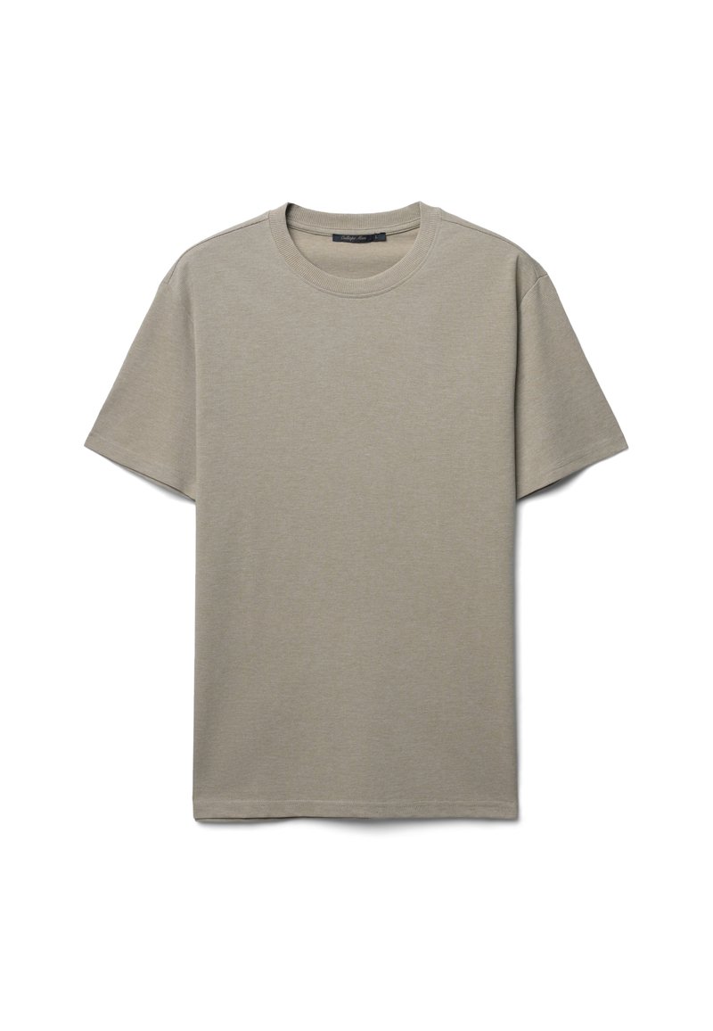 T-shirt corto a maniche corte color beige chiaro realizzato in cotone morbido. Presenta un colletto rotondo e un design semplice e privo di decorazioni. Vestibilità classica.