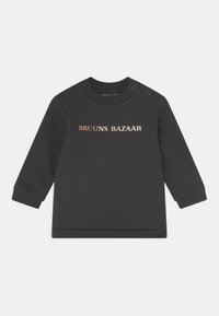 Sweatshirt preto com mangas longas, apresentando um decote arredondado e botões nos ombros. "BRUU NS BAZAAR" impresso em rosa dourado na parte da frente.