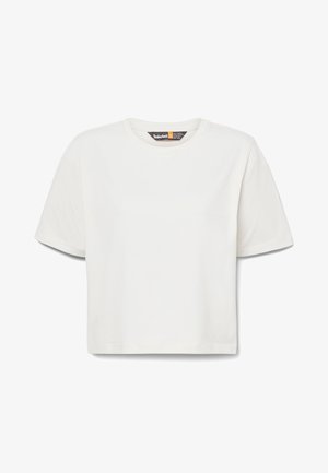 T-shirt blanc court en coton doux. Il présente des manches courtes et un col rond. Design simple sans motifs ni graphiques.