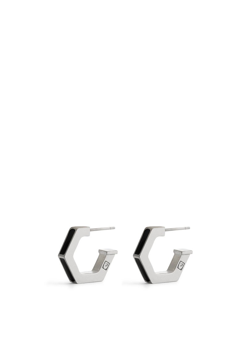 Silver geometric hoop earrings featuring a hexagonal shape, polished metal finish, and a slim black accent on the edges.