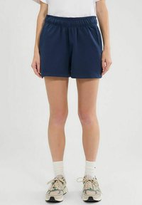 Dunkelblaue Damen-Sportshorts mit elastischem Bund, glatter Textur und Seitentaschen, mit einem kleinen Logo am Saum.
