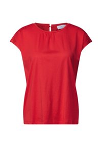 Haut rouge à manches courtes en tissu doux, avec un col rond et un détail en forme de trou de serrure au dos avec une fermeture à bouton.