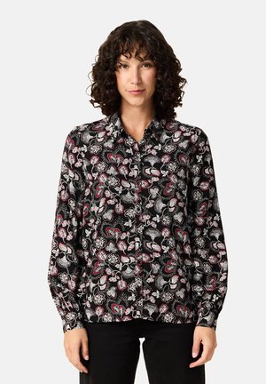 Schwarz cam shirt mit einem Paisleymuster in Weiß und Rot. Lange Ärmel mit geknöpften Manschetten, klassischer Kragen und weicher Stofftextur.