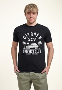 Černé bavlněné tričko se bílou grafikou Citroën auta, palmami a textem "CITROËN 2CV DRIVER'S CLUB PARIS FRANCE."