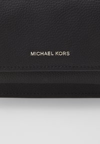 MICHAEL Michael Kors CLAIRE XBODY - Cross body bag - black