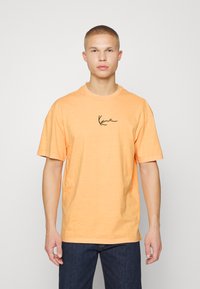 Karl Kani SMALL SIGNATURE WASHED TEE UNISEX - T-shirt estampada - light orange