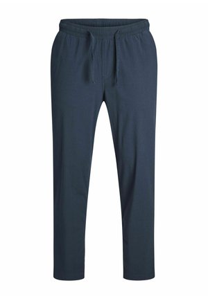 Marineblå træningsbukser lavet af blødt stof, med elastisk talje, justerbar snøre og tapered ben med manchetter.