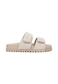 Beige suede slide sandals with two wide upper straps and a textured rubber sole featuring a ridged edge for grip.
