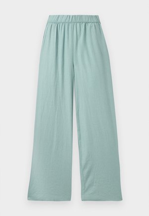 Pantalones anchos de color verde claro, hechos de una tela suave, con una cinturilla elástica y una textura sutil, diseñados para la comodidad y la facilidad de movimiento.