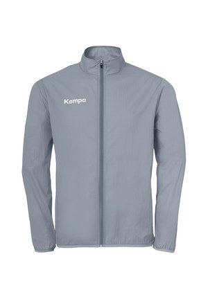 Giacca grigio chiaro con zip intera, maniche lunghe e piccolo logo Kempa sulla parte superiore sinistra del petto.