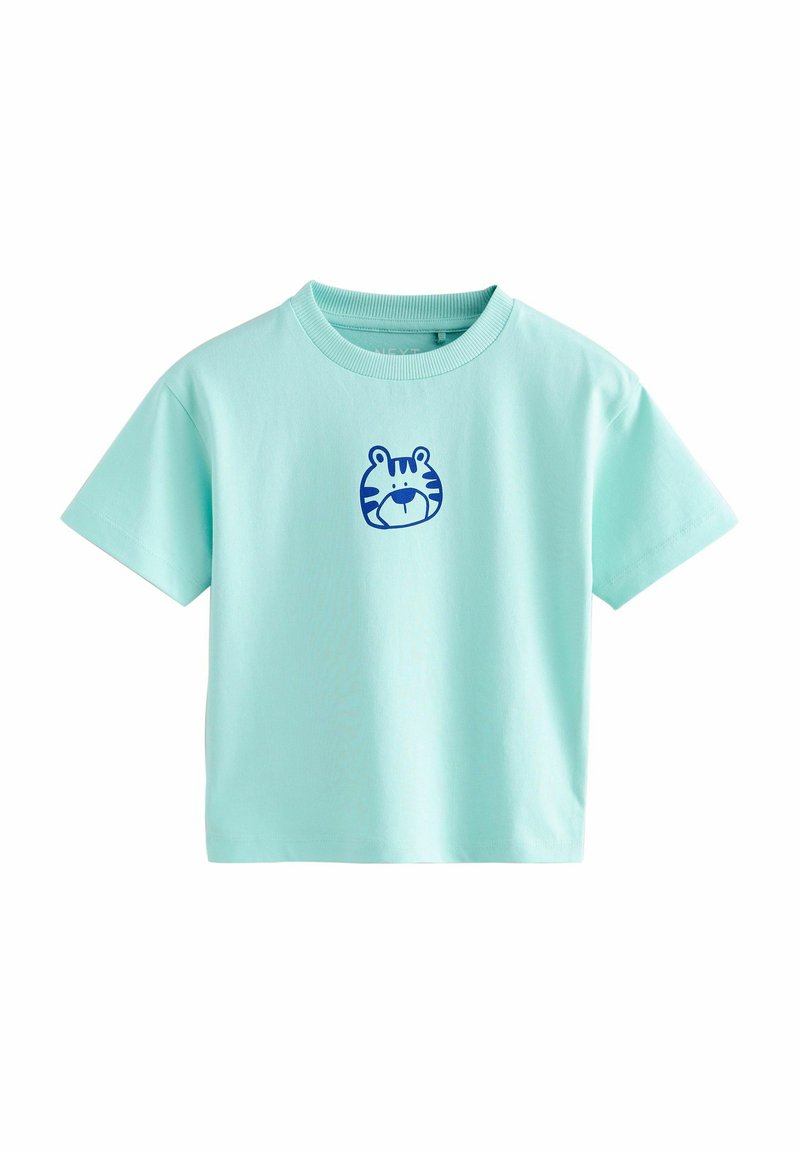T-shirt vert menthe à manches courtes en coton, avec un graphique de visage de tigre bleu sur la poitrine. Design à col rond avec une coupe décontractée.