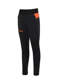 Black athletic pants with orange accents, featuring a fitted design, elastic waistband, and the "Hummel" logo on the left thigh.