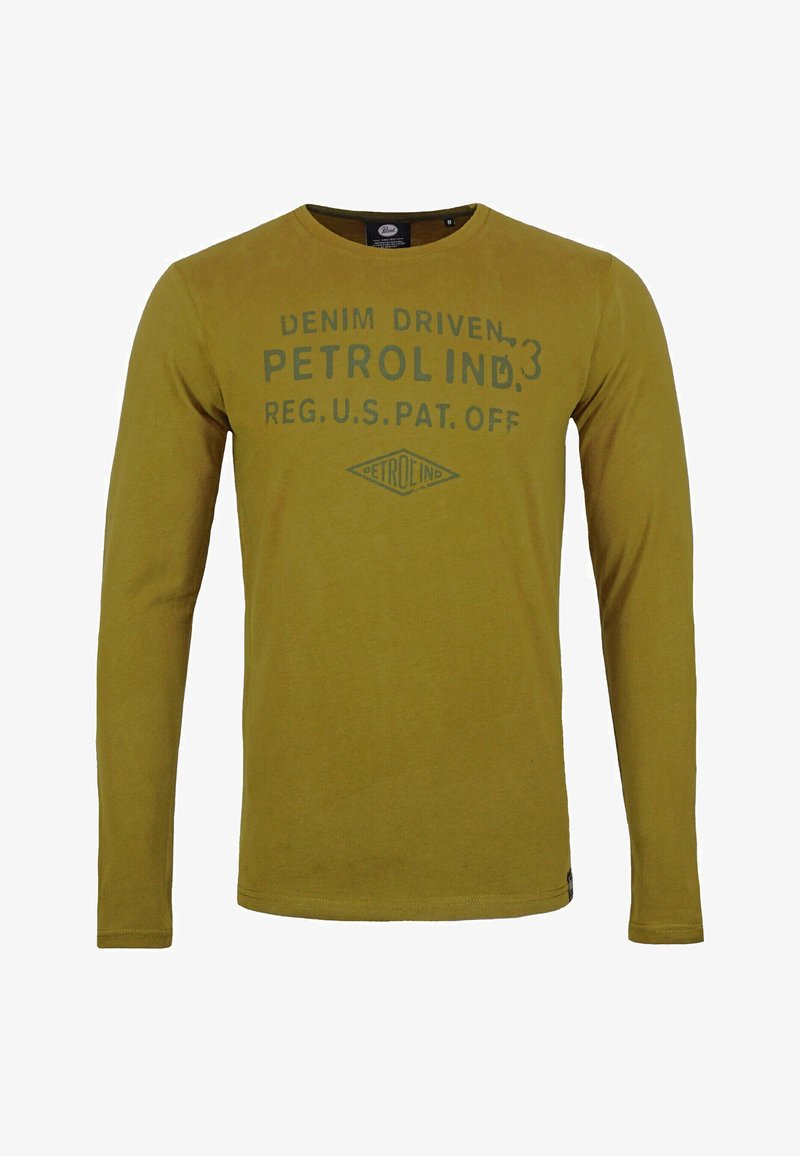 Hosszú ujjú mustárszínű ing kerek nyakkivágással. Elülső oldalán zöld nyomott szöveg és gyémánt logó található. Puha, könnyű anyag.