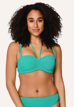 Haut de bikini turquoise avec texture côtelée, design bandeau avec un bon soutien et bretelles réglables. Les coutures au centre ajoutent de la structure.