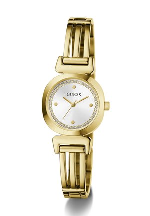 Montre Guess couleur or avec un cadran blanc rond, des accents en cristal autour du cadran et un bracelet métallique à maillons.