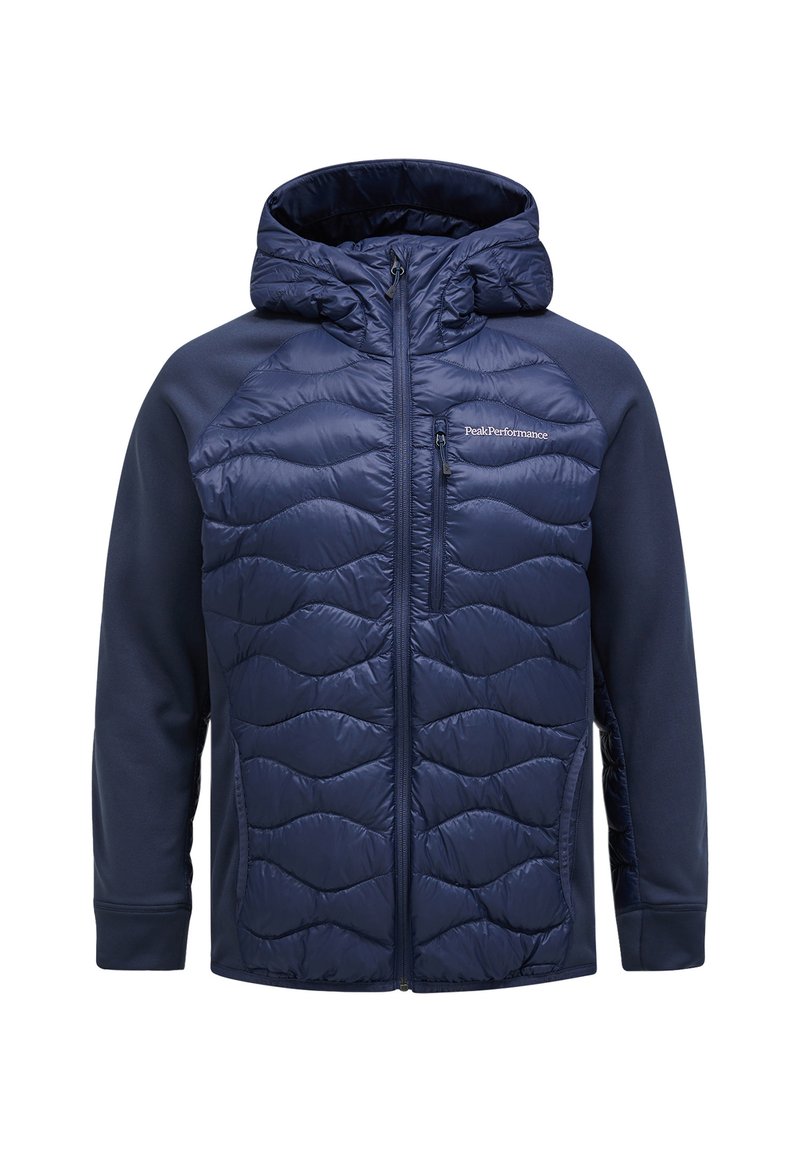Navy blue puffer jacket with a hood, featuring a quilted design on the front, zippered chest pocket, and contrasting soft fabric sleeves.