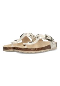 Witte sandalen met een gespikkeld patroon, verstelbare band, gewatteerde kurken binnenzool en een flexibele rubberen zool.