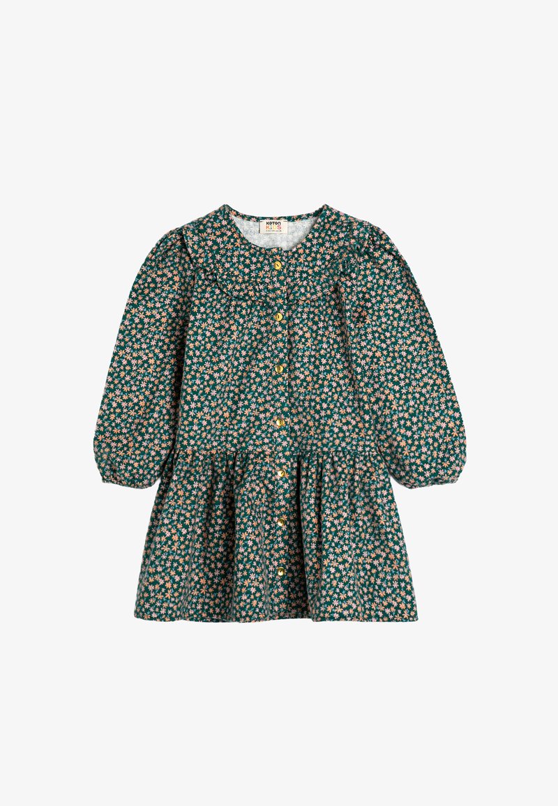 Bloemenjurk in het groen met roze en witte patronen. Lange mouwen, ronde kraag, knopenlijst aan de voorkant en een geplooid taille met een uitlopende rok.