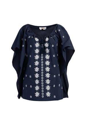 Bluză din bumbac de culoare bleumarin, cu broderie florală albă pe partea din față, cu un decolteu larg și mâneci fluide. Detaliu cu ciucuri la decolteu.