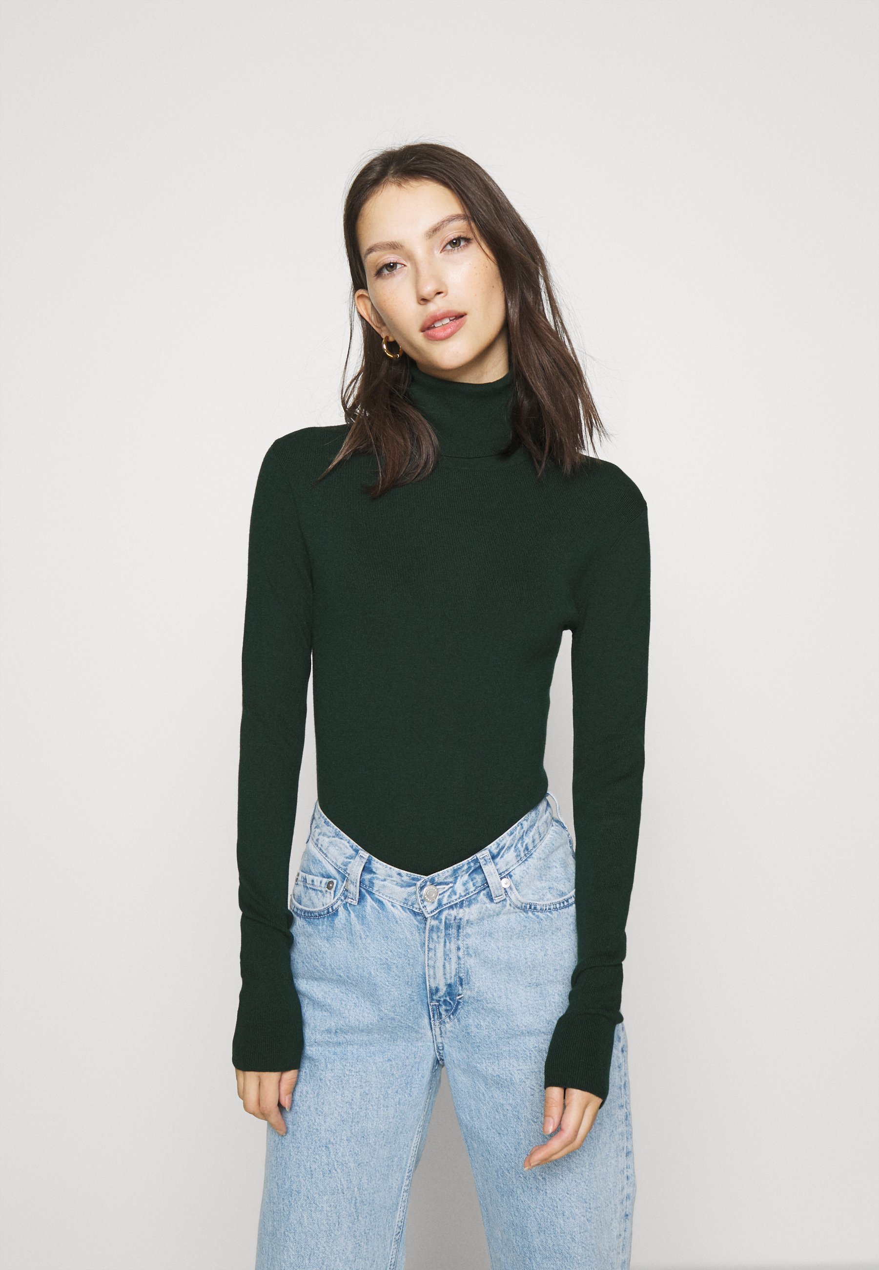 dark green turtleneck