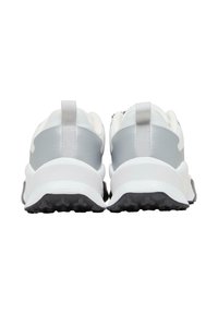 Lettdempede joggesko med hvit overdel og grå detaljer. Polstret såle med teksturert svart gummisåle for grep.