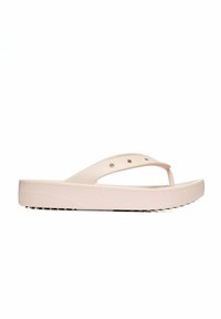 Sandalo flip-flop platform rosa chiaro con suola testurizzata e design della fascia perforato, mostrato di lato su uno sfondo bianco.
