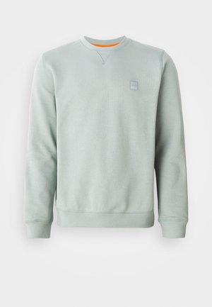 Light green crewneck sweatshirt with long sleeves, ribbed cuffs and hem, and small embossed logo on left chest.