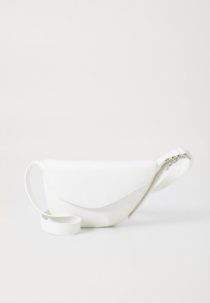 White leather fanny pack with a curved design, a flap closure, and an adjustable strap featuring a metal hardware accent. Smooth texture.