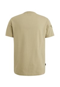 Lys beige t-shirt lavet af bomuld, med rund hals, korte ærmer og en lille logo-detalje på venstre skulder.