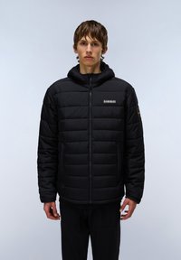 Black puffer jacket with a zip closure and a hood. Features quilted padding, side pockets, and a logo label on the chest. Smooth texture.
