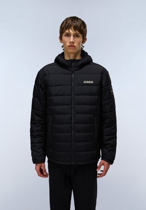 Black puffer jacket with a zip closure and a hood. Features quilted padding, side pockets, and a logo label on the chest. Smooth texture.