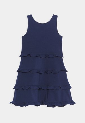 Navy blue sleeveless dress featuring three layered ruffles along the hem, made from a soft, stretchy fabric with a round neckline.