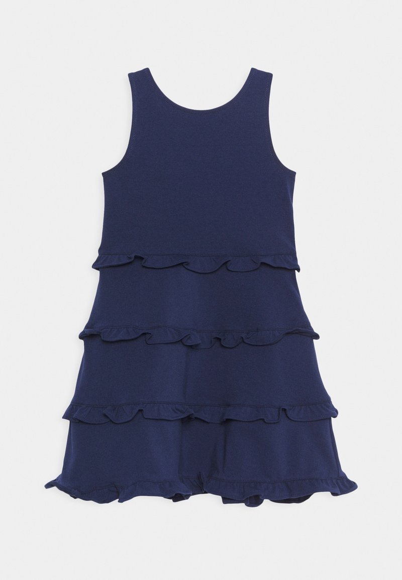 Navy blue sleeveless dress featuring three layered ruffles along the hem, made from a soft, stretchy fabric with a round neckline.