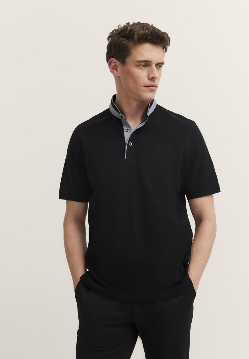 Black short-sleeve polo shirt with a contrasting light blue collar, two-button placket, and subtle logo on the left side.
