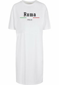 Bílé tričko šaty s krátkými rukávy, s nápisem "Roma" v černé barvě nad "ITALIA" a zelenými a červenými akcenty dole. Měkký bavlněný materiál.