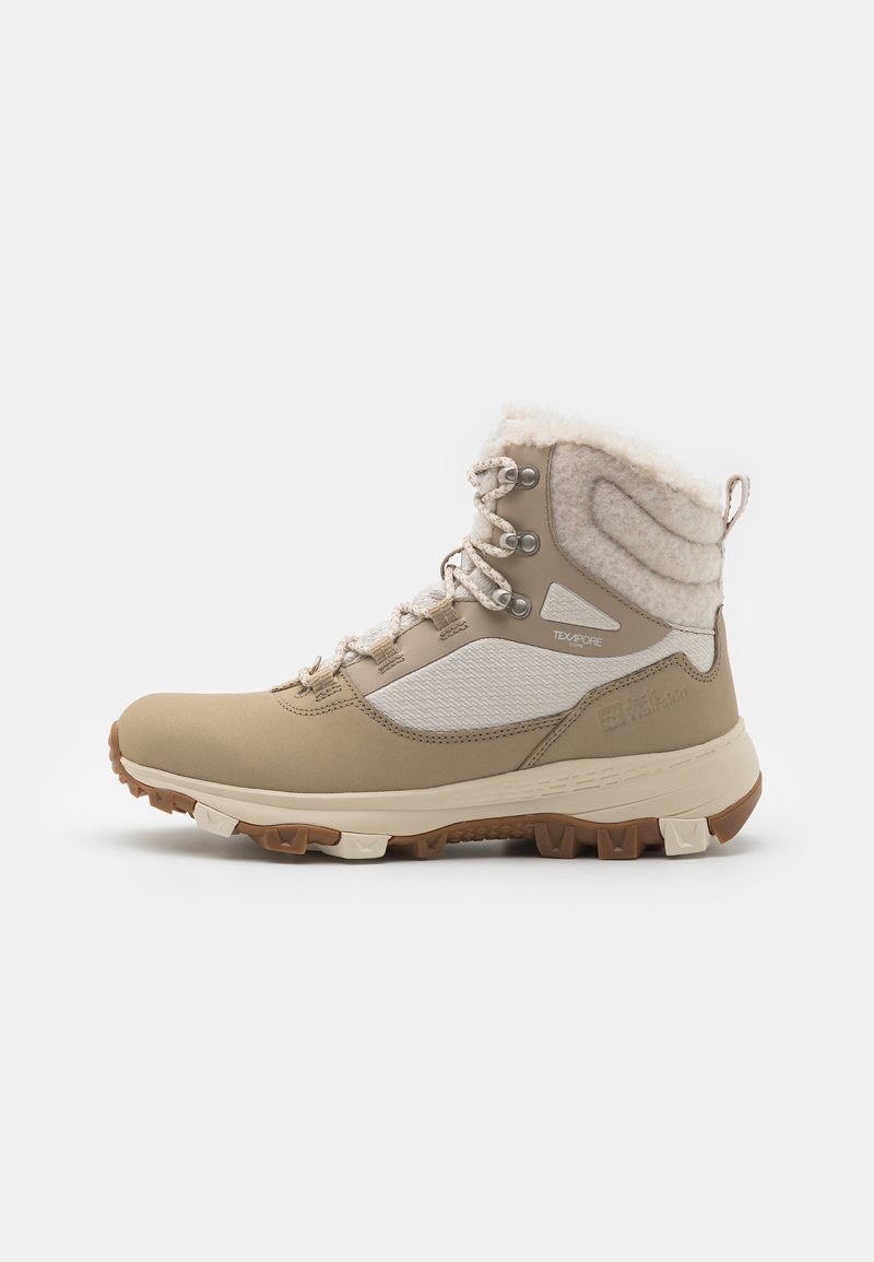 Beige high-top hiking boots with a textured wool collar, white mesh accents, and rugged rubber sole, featuring metal eyelets and laces.