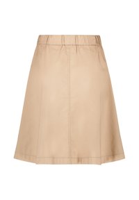 Vaaleanbeige, polvipituinen hame, joka on valmistettu kevyestä kankaasta. Hameessa on joustava vyötärö ja levenevä muoto, jossa on siistit saumat. Ei näkyviä kuvioita tai korostuksia.