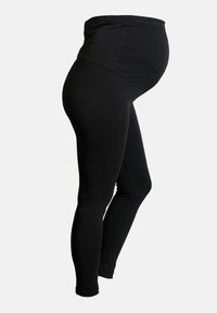 Mallas negras con una cinturilla alta y elástica diseñada para adaptarse a una barriga en crecimiento. Textura suave con una silueta ajustada.