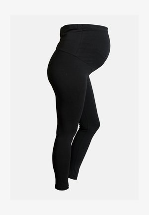Leggings neri con una vita alta e elasticizzata, progettati per adattarsi a una pancia in crescita. Texture liscia con una silhouette aderente.